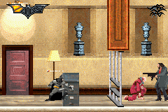 Batman Begins (Game Boy Advance) screenshot: That SMG can really hurt you