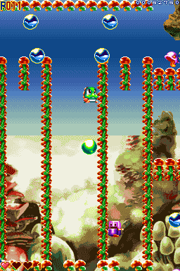 Bubble Bobble Revolution (Nintendo DS) screenshot: The player can bounce up on his own bubbles.