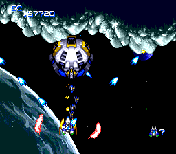 Nexzr (TurboGrafx CD) screenshot: This stage's end boss is the same as the mid-level one, only this form is much easier to defeat