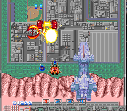 Image Fight II: Operation Deepstriker (TurboGrafx CD) screenshot: Flying over a city. Destruction ensues