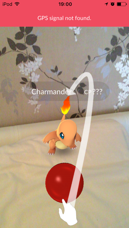 Pokémon GO (iPhone) screenshot: Catching your first Pokémon.