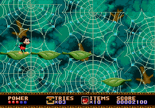 Castle of Illusion starring Mickey Mouse (Genesis) screenshot: Giant cobwebs are in the background