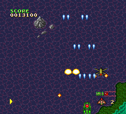 Cyber-core (TurboGrafx-16) screenshot: Ground-based enemies can only be hit with the slower, short-ranged weapon.