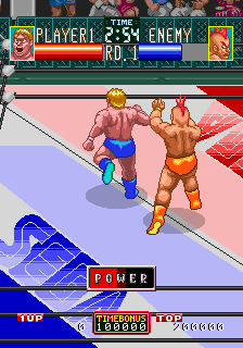 Wrestle War (Arcade) screenshot: He has thrown you to the ropes.