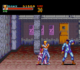 Riot Zone (TurboGrafx CD) screenshot: ...has two stages; an annoying female boss helps her boyfriend here