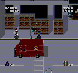 Batman (TurboGrafx-16) screenshot: Gotham City streets are riddled with dangers: red vans and mimes.