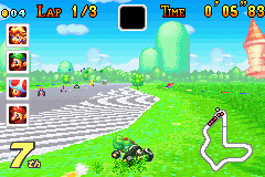 Mario Kart: Super Circuit (Game Boy Advance) screenshot: Driving in the grass is much slower than driving on the road.