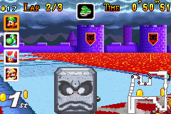 Mario Kart: Super Circuit (Game Boy Advance) screenshot: Being squashed by a thwomp, a frequent hazard on the tracks with a Bowser Castle theme.