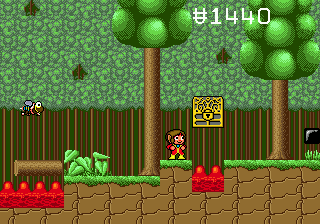 Alex Kidd in the Enchanted Castle (Genesis) screenshot: Jumping over lava pits