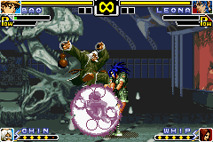 The King of Fighters EX: Neo Blood (Game Boy Advance) screenshot: Leona blocking a joint offensive formed by Bao's Psycho Ball Crash: Reflect and Chin's striker move.