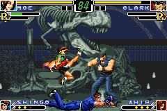 The King of Fighters EX: Neo Blood (Game Boy Advance) screenshot: With Shingo immobilizing Clark by the feet, Moe tries a attack using her command move Waving Grain.