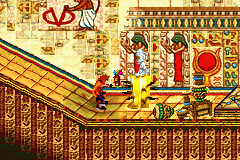 Crash Bandicoot 2: N-Tranced (Game Boy Advance) screenshot: A reinforced-bad-mummy-fellow are in Crash's way: it's time to use a final attack and finish him!