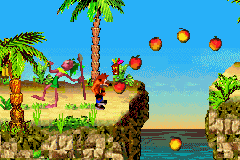 Crash Bandicoot 2: N-Tranced (Game Boy Advance) screenshot: Now, Crash's way is now separated by a big pit... And some more of those Wumpa Fruits!!!