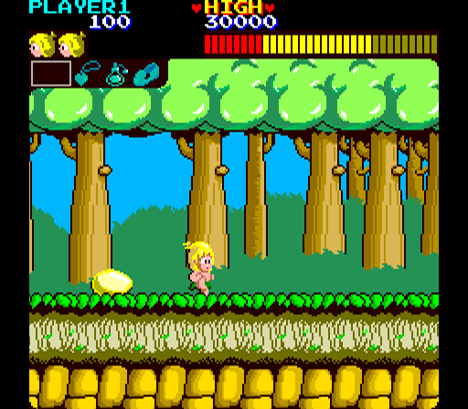 Wonder Boy (Arcade) screenshot: Break the egg for a power-up.