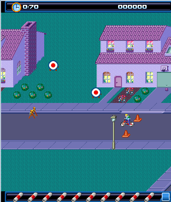 Paperboy: Wheels on Fire (J2ME) screenshot: Some targets to hit and the new non-isometric perspective that is sometimes shown