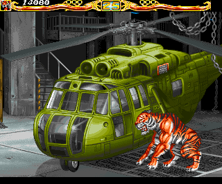 Fightin' Spirit (Amiga CD32) screenshot: Bonus round. Smash that helicopter to pieces.