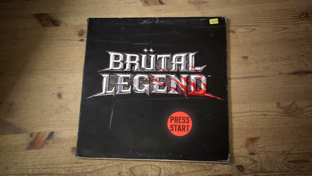 Brütal Legend (Windows) screenshot: Game title and main menu are presented as a vinyl record cover. Awesome.