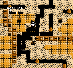 Hottāman no Chitei Tanken (NES) screenshot: This dynamite stick will allow you to blow up a block