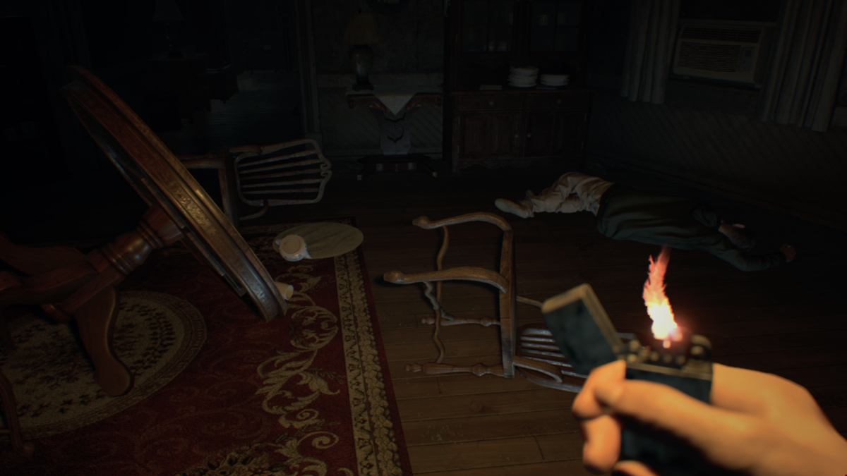 Resident Evil 7: Biohazard - Banned Footage: Vol.2 (Windows) screenshot: Daughters: Zoe's only source of light is the lighter. Looks like there was a struggle in the living room
