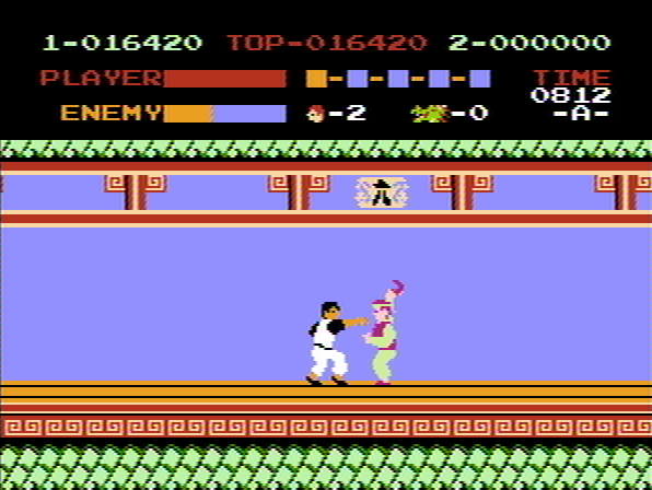Kung-Fu Master (NES) screenshot: 2nd boss throws boomerangs.