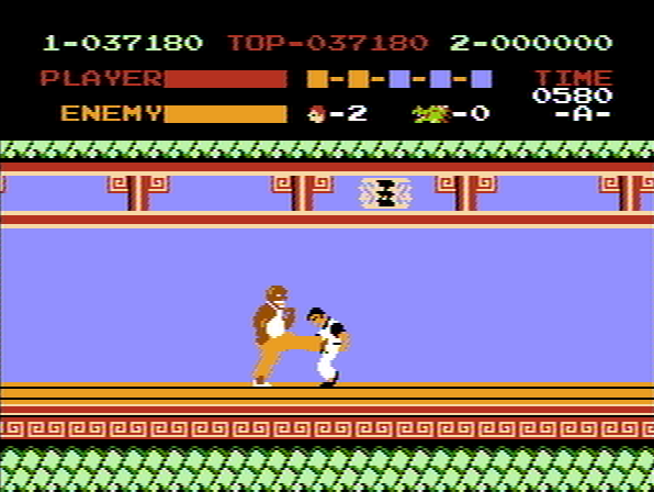 Kung-Fu Master (NES) screenshot: 3rd boss kicking Thomas.