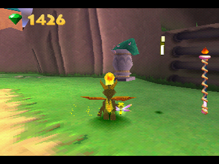 Spyro: Year of the Dragon (PlayStation) screenshot: The superflame powerup can destroy some objects.