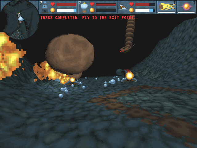 Magic Carpet 2: The Netherworlds (DOS) screenshot: Firing a meteor at a dragon and two worms inside a dark cave