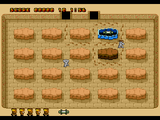 Oh Mummy Genesis (Genesis) screenshot: Walking around a sarcophagus opens it; there are several different possible contents. The player needs to collect at least a key and one treasure to exit.