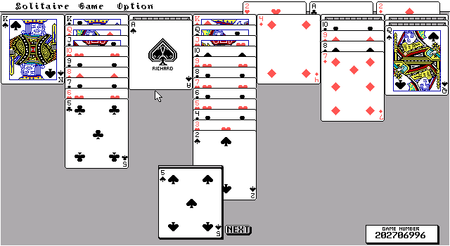 TEGL Klondike Solitaire (DOS) screenshot: After some moves, the top stacks are growing. The name on the Ace of Spades is the authors.