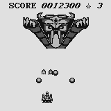 Jaguar Bomber (Supervision) screenshot: Fighting the incredibly flickery boss of the first stage. He doesn't move, so you don't need to either.