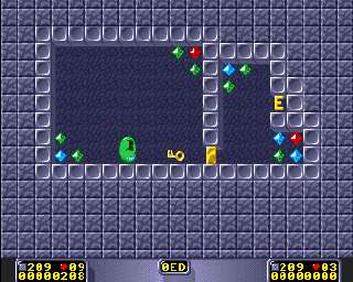 BrainMan (Amiga) screenshot: We kick the key in the general direction of the closed door.
