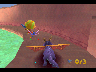 Spyro 2: Ripto's Rage! (PlayStation) screenshot: Chasing the wily thief to retrieve one of the magic lamps.