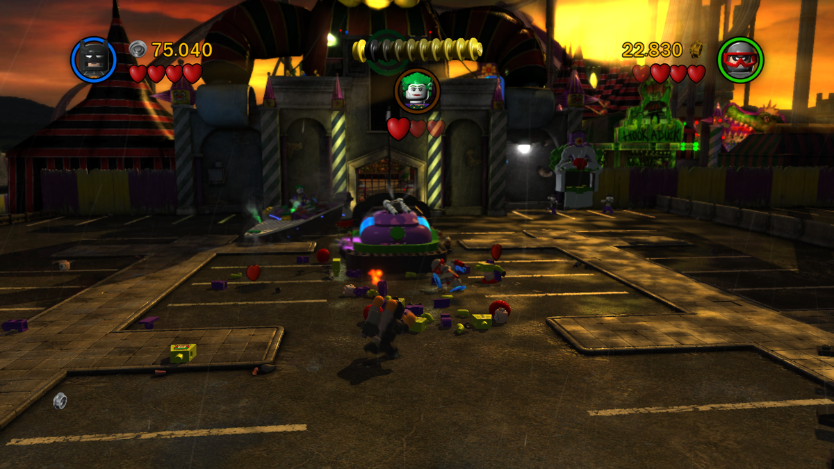 LEGO Batman 2: DC Super Heroes (Windows) screenshot: Fighting the Joker at the entrance to the Amusement park