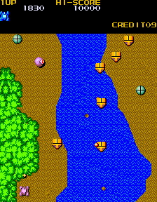 Mega Zone (Arcade) screenshot: Static guns and moving enemies