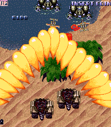 Guardian Storm (Arcade) screenshot: Bomb attack (character 4)