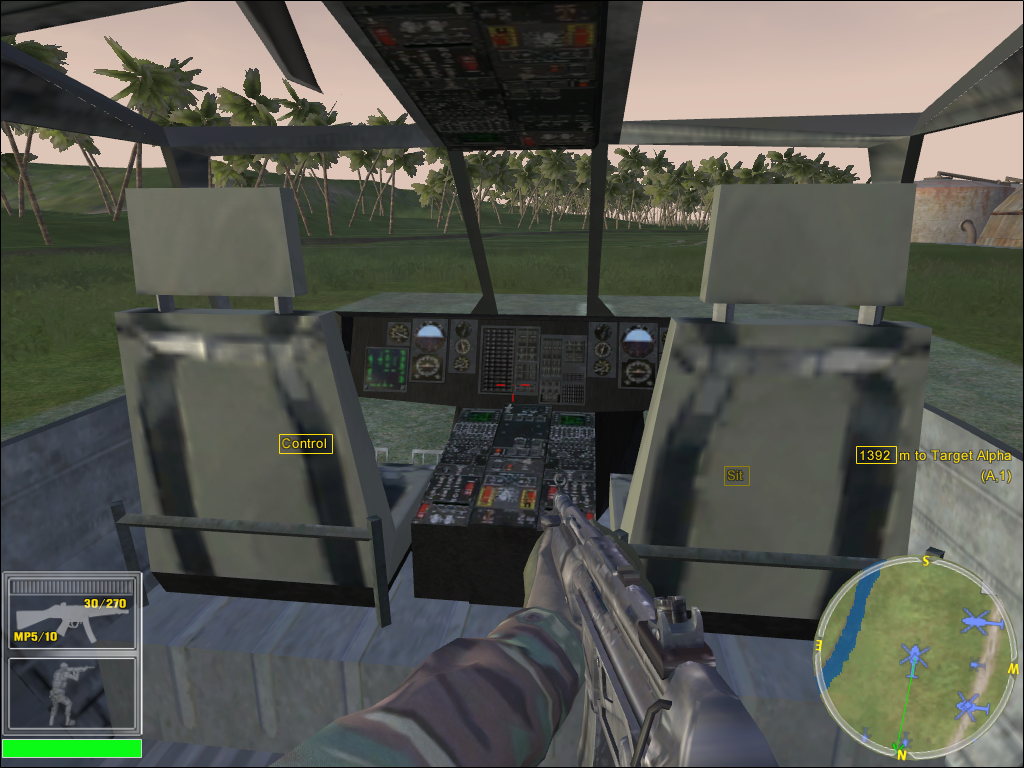 Joint Operations: Typhoon Rising (Windows) screenshot: Take a seat in the Little Bird. The left part of the HUD shows the soldiers outfit.