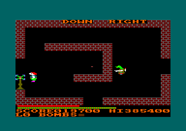 Survivor (Amstrad CPC) screenshot: Signposts show the direction to the bombs
