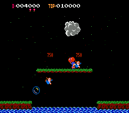Balloon Fight (NES) screenshot: Throw enemy to the water!
