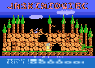 Jaskiniowiec (Atari 8-bit) screenshot: Caveman can use the ladder