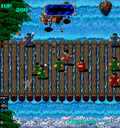 Heavy Barrel (Arcade) screenshot: Fighting on a bridge.