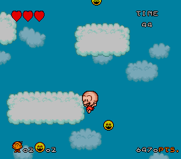 Super Bonk (SNES) screenshot: In the clouds