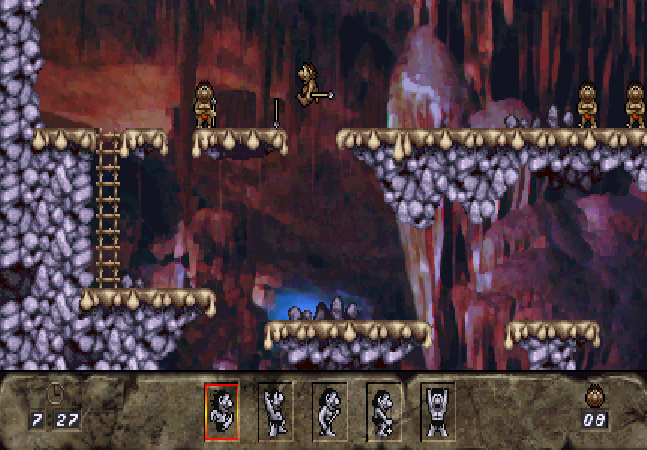 The Humans (Jaguar) screenshot: Jumping a large gap with the spear.