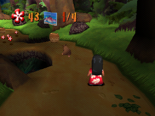 Disney's Lilo & Stitch: Trouble in Paradise (PlayStation) screenshot: Watch out Lilo! this rat is dangerous.
