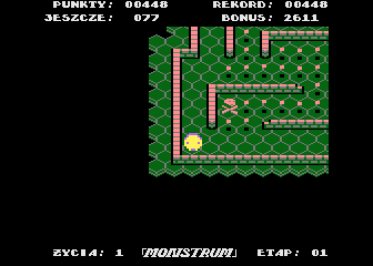 Monstrum (Atari 8-bit) screenshot: he snake loses a life when he falls into the skull