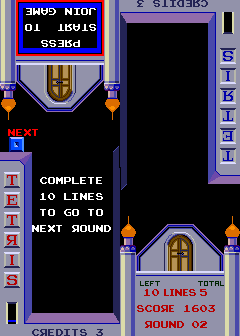 Tetris (Arcade) screenshot: Instructions for next level.