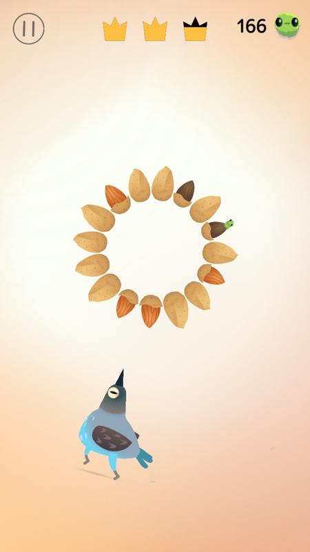 Pigeon Pop (Android) screenshot: You need to pick these nuts twice... First to crack them open, and then eat them if they're ripe
