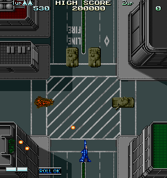 Vapor Trail (Arcade) screenshot: Shoot the tanks.