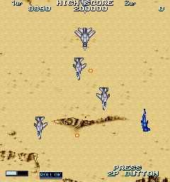 Vapor Trail (Arcade) screenshot: Over the desert.