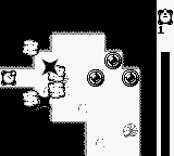 Trax (Game Boy) screenshot: Blasting into a cave.