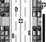 Trax (Game Boy) screenshot: Swift motorcycles can make quick work of a tank